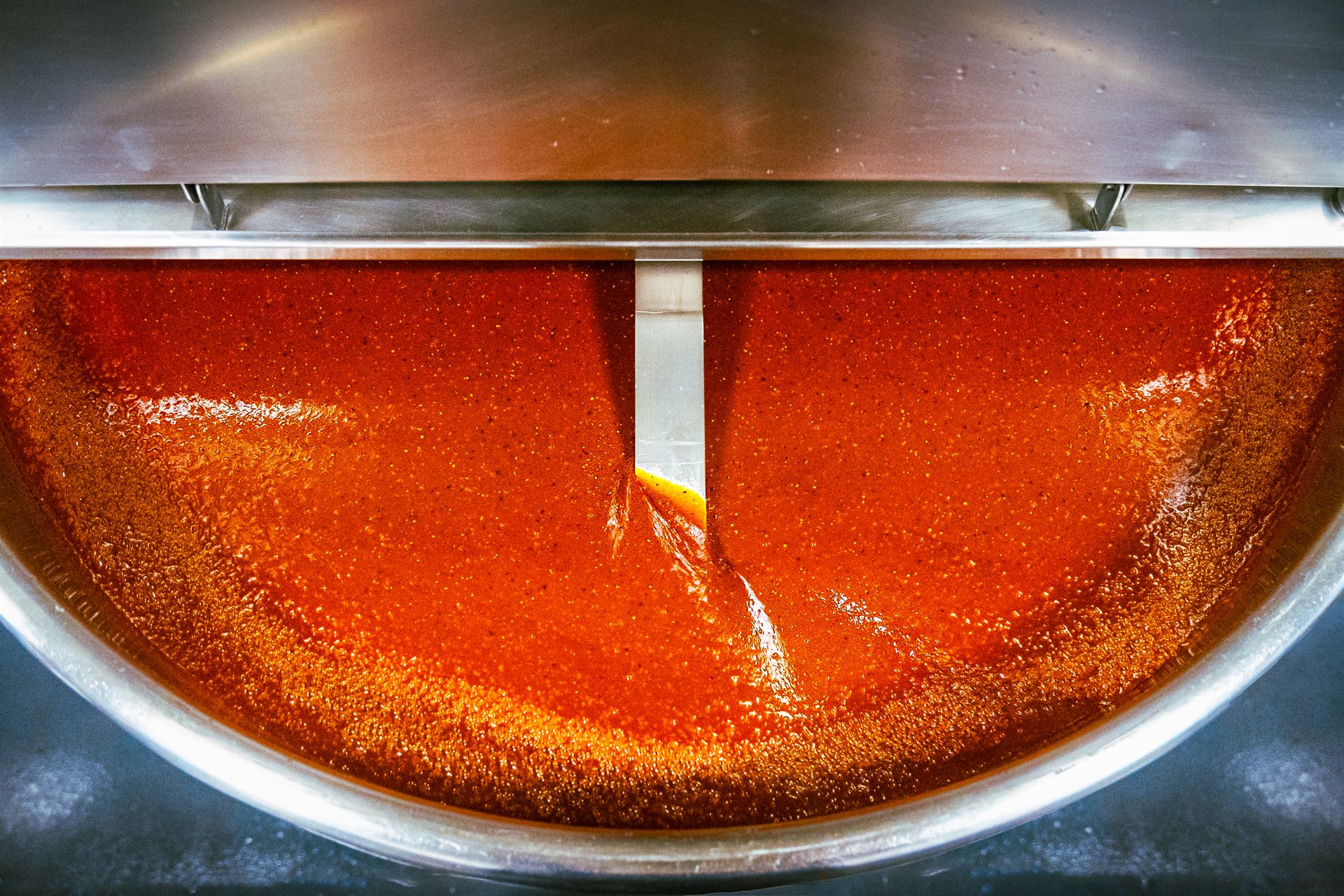Red sauce cooking in the kettle